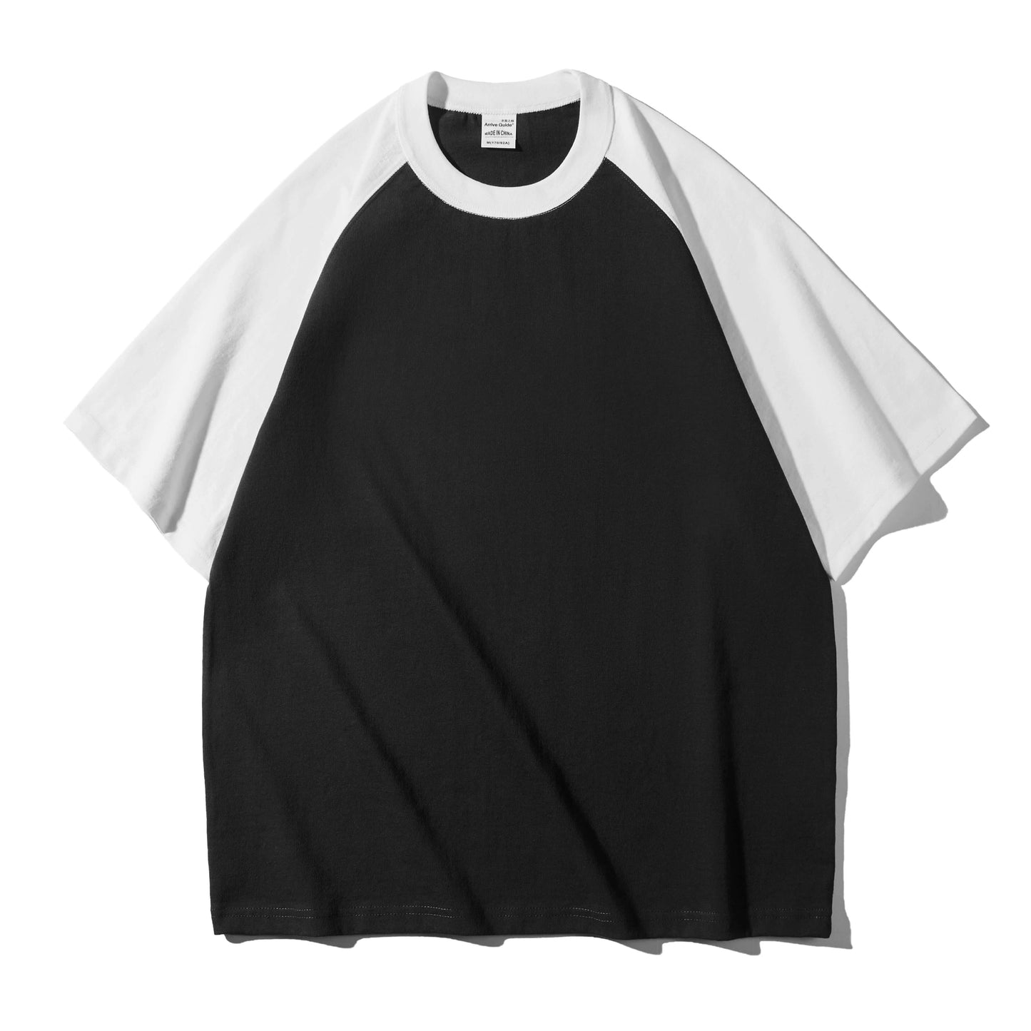 Color-blocked Craftklart Dropship oversized T-shirt in 300GSM fabric, worn with intention, showcasing a casual, relaxed fit.