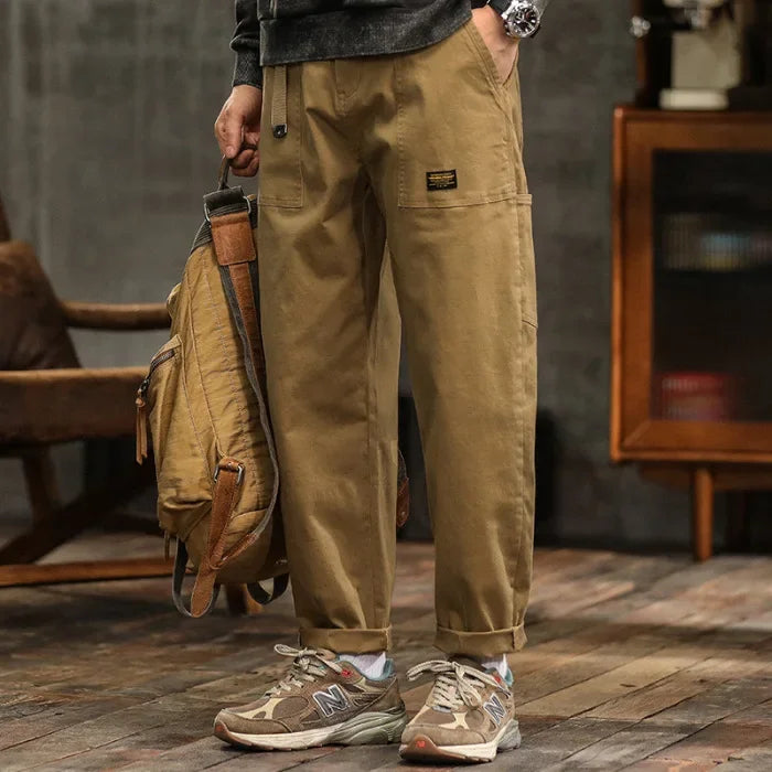 Craftklart men's cargo trousers in loose fit utility streetwear style, featuring multiple pockets and casual, comfortable design.