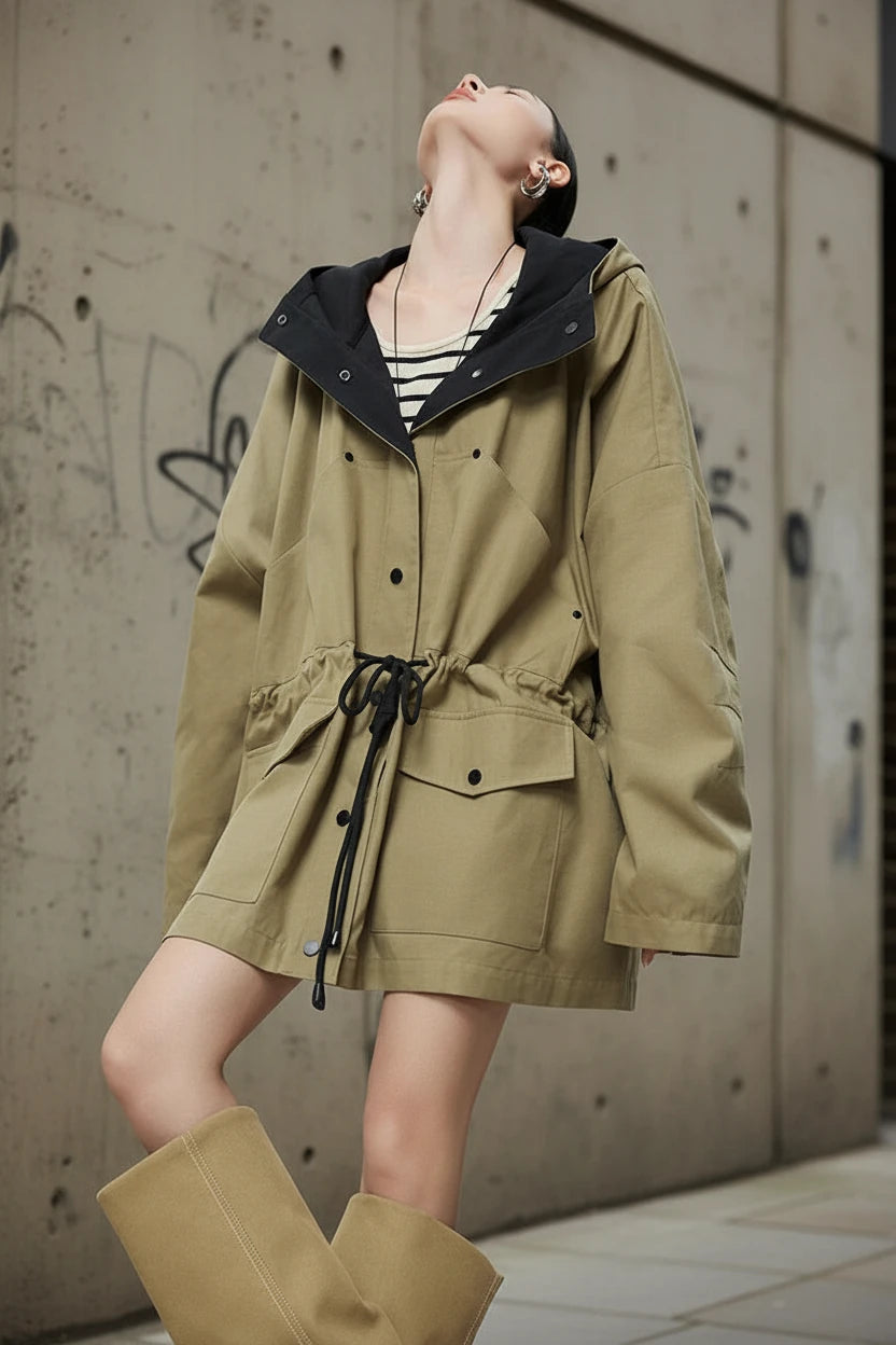 Khaki oversized hooded windbreaker jacket by Urban Fashion & Streetwear Craftklart, featuring a relaxed fit and adjustable hood.