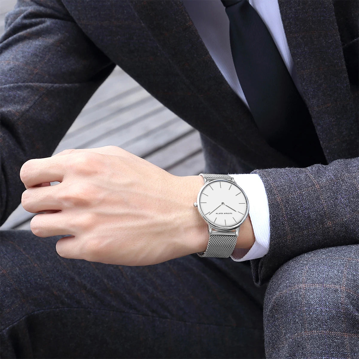 Minimal Quartz Watch by Craftklart with stainless steel band, featuring a sleek round dial and modern design.