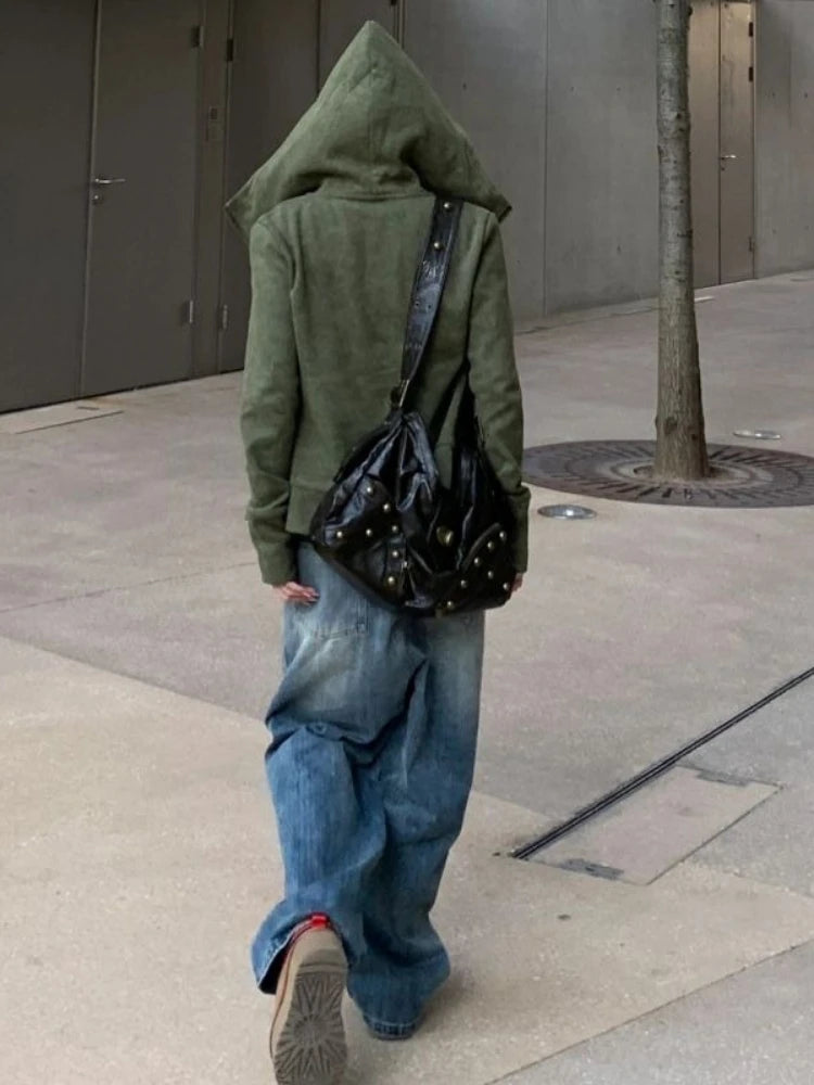 Sage green oversized zip-up hoodie by Craftklart, showing the relaxed fit, front zipper, and casual style in a close-up image.