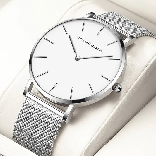 Minimal Quartz Watch by Craftklart with stainless steel band, featuring a sleek round dial and modern design.