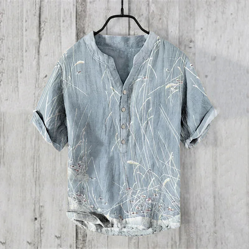 Men's 100% linen casual Hawaiian V-neck short sleeve shirt by Craftklart Dropship, featuring a relaxed fit and vibrant print.