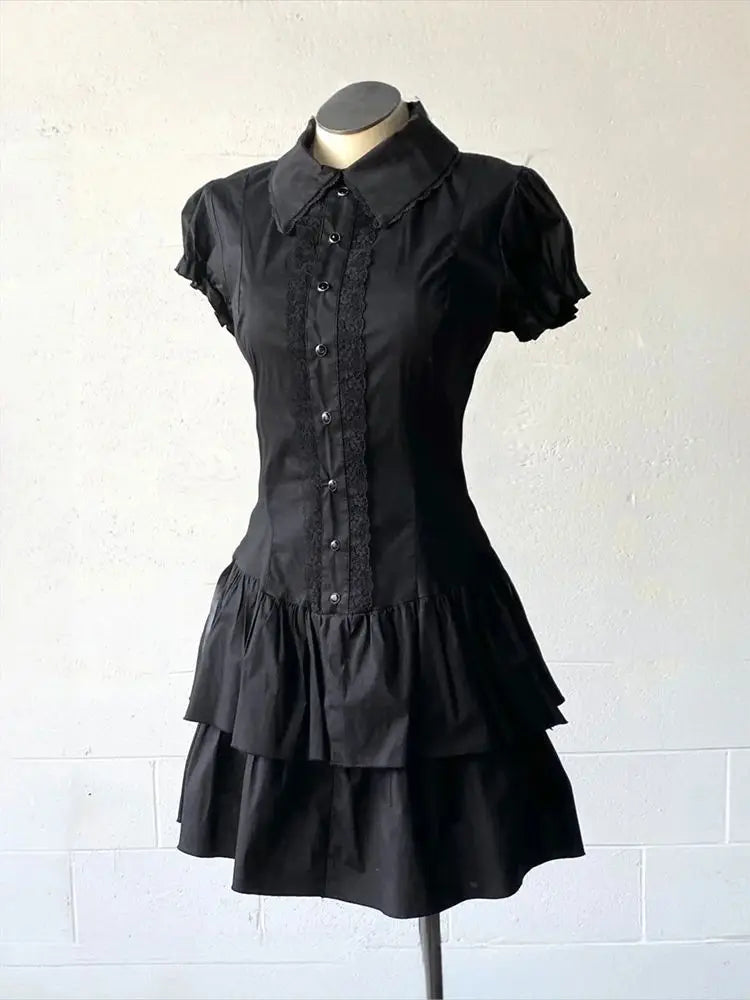 Black patchwork mini dress from Urban Fashion & Streetwear, featuring a fitted silhouette and stylish patchwork details.