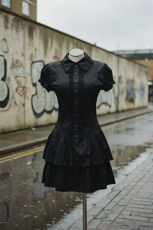 Black patchwork mini dress from Urban Fashion & Streetwear Craftklart with a fitted silhouette and stylish patchwork design.