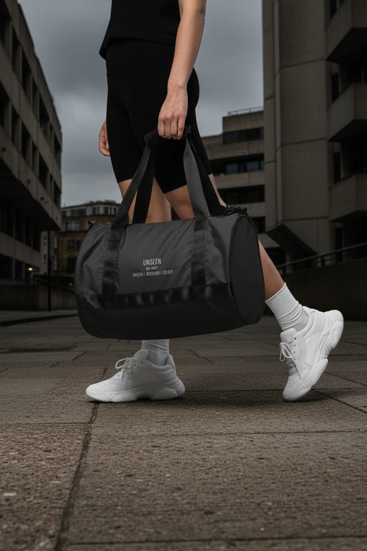 Craftklart Gym Holdhall all-over-print gym bag with white background, featuring the brand's logo and spacious design for fitness gear.