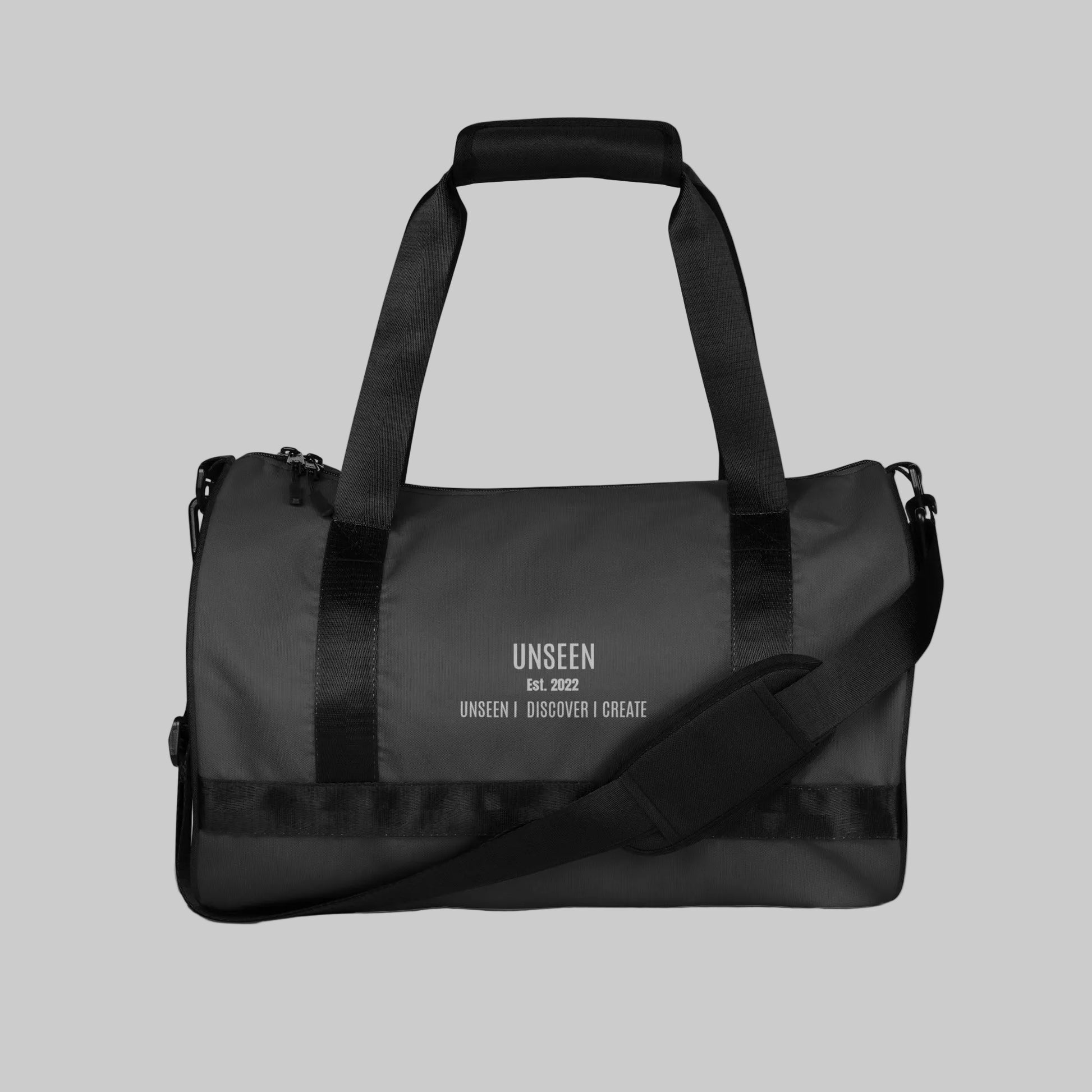 Craftklart gym holdhall bag with all-over white print, showcasing durable fabric and spacious design for fitness gear.