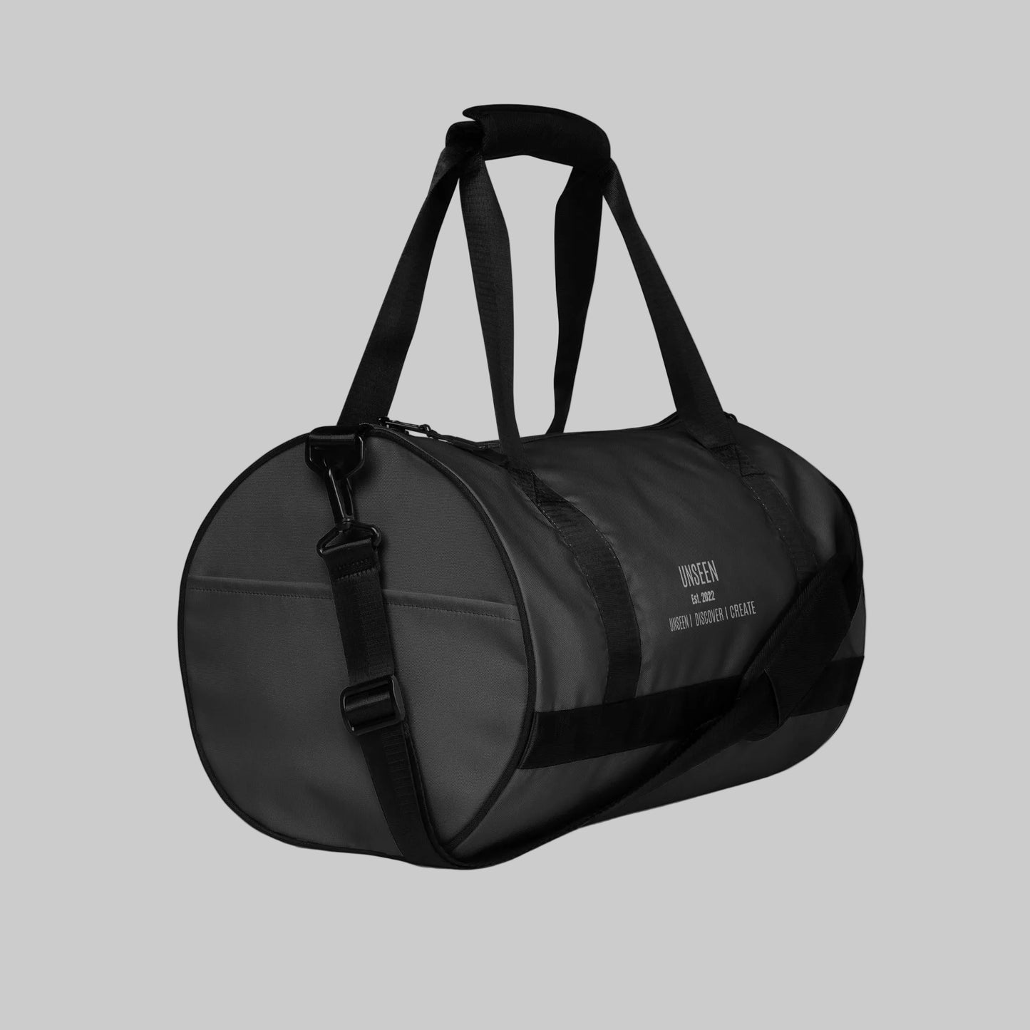 White Craftklart gym holdall bag with all-over print, shown from the right front side. Durable sports bag for gym and travel.