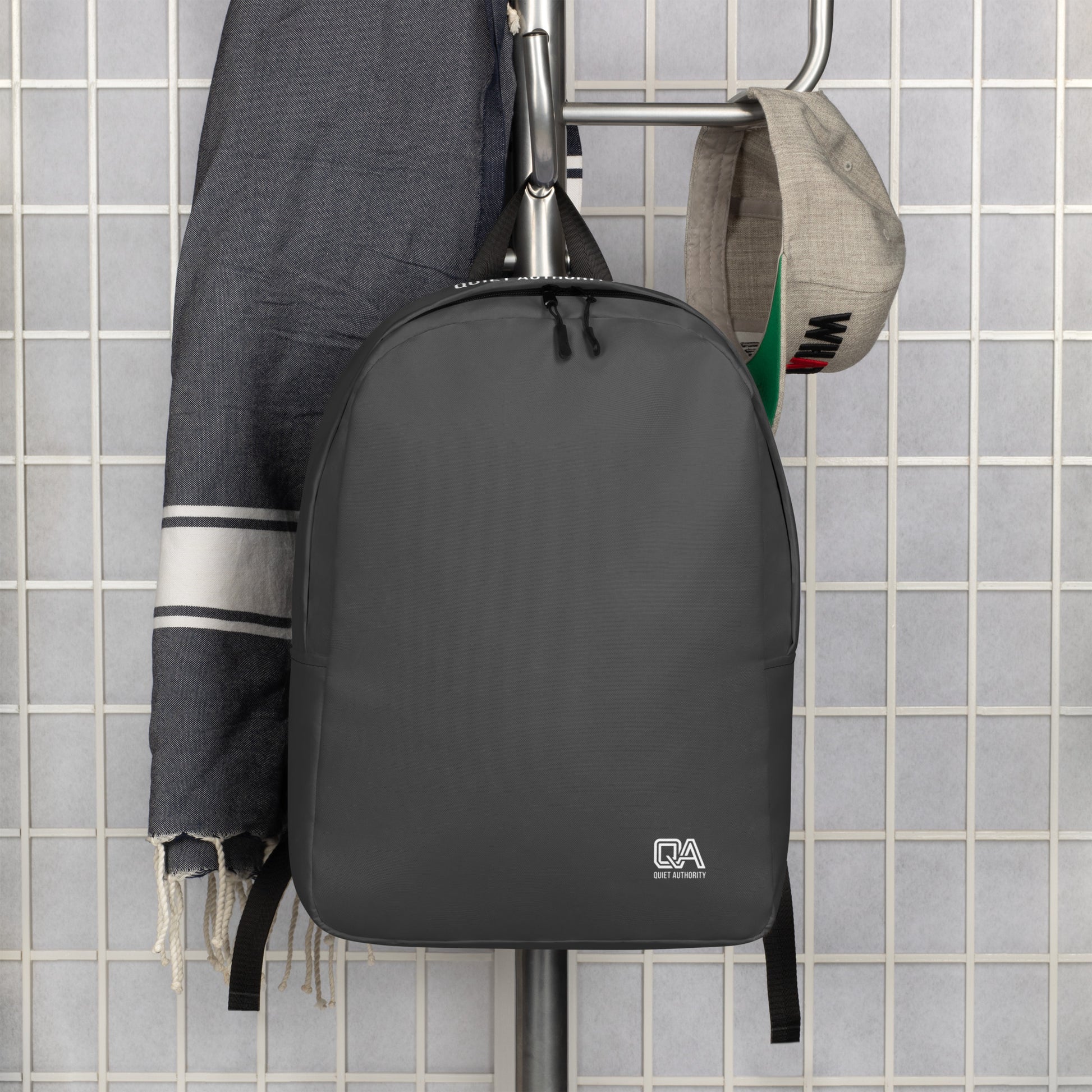 White Craftklart minimalist urban backpack by Printify featuring all-over print and water-resistant design for everyday carry