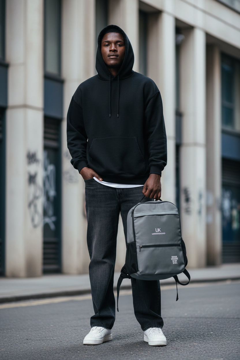 Black Urban Utility Backpack by Urban Fashion & Streetwear with all-over print, front view showing multiple compartments and sturdy straps.