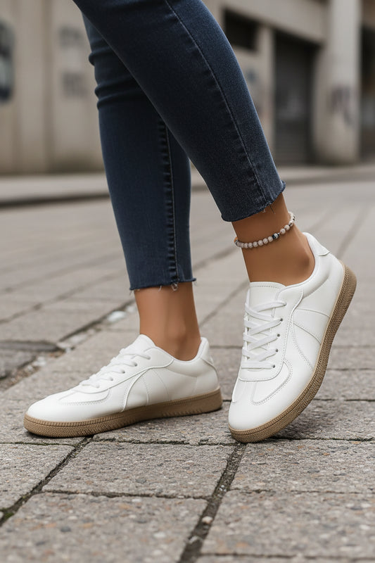 Off-White round toe lace-up flat sneakers by Craftklart, featuring white canvas material and classic sneaker design.