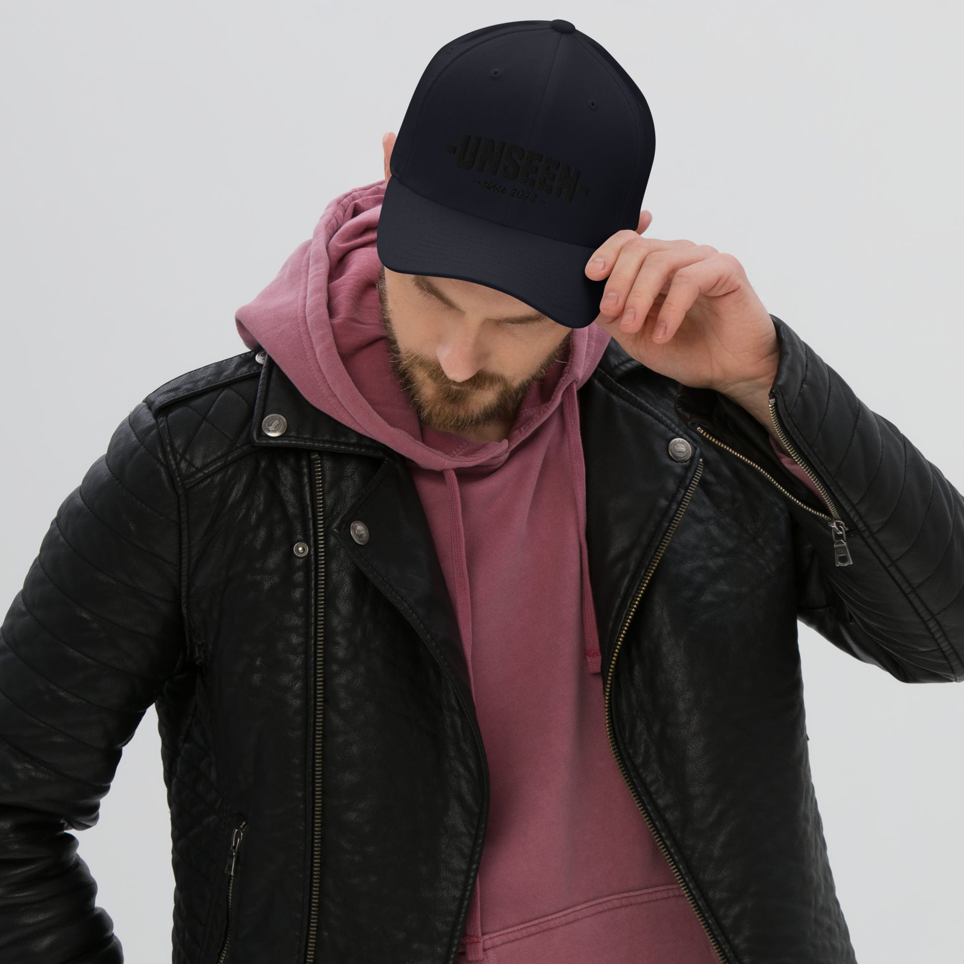 Dark navy Shadow Unseen Urban structured twill cap with closed back, featuring a curved brim and embroidered front design.