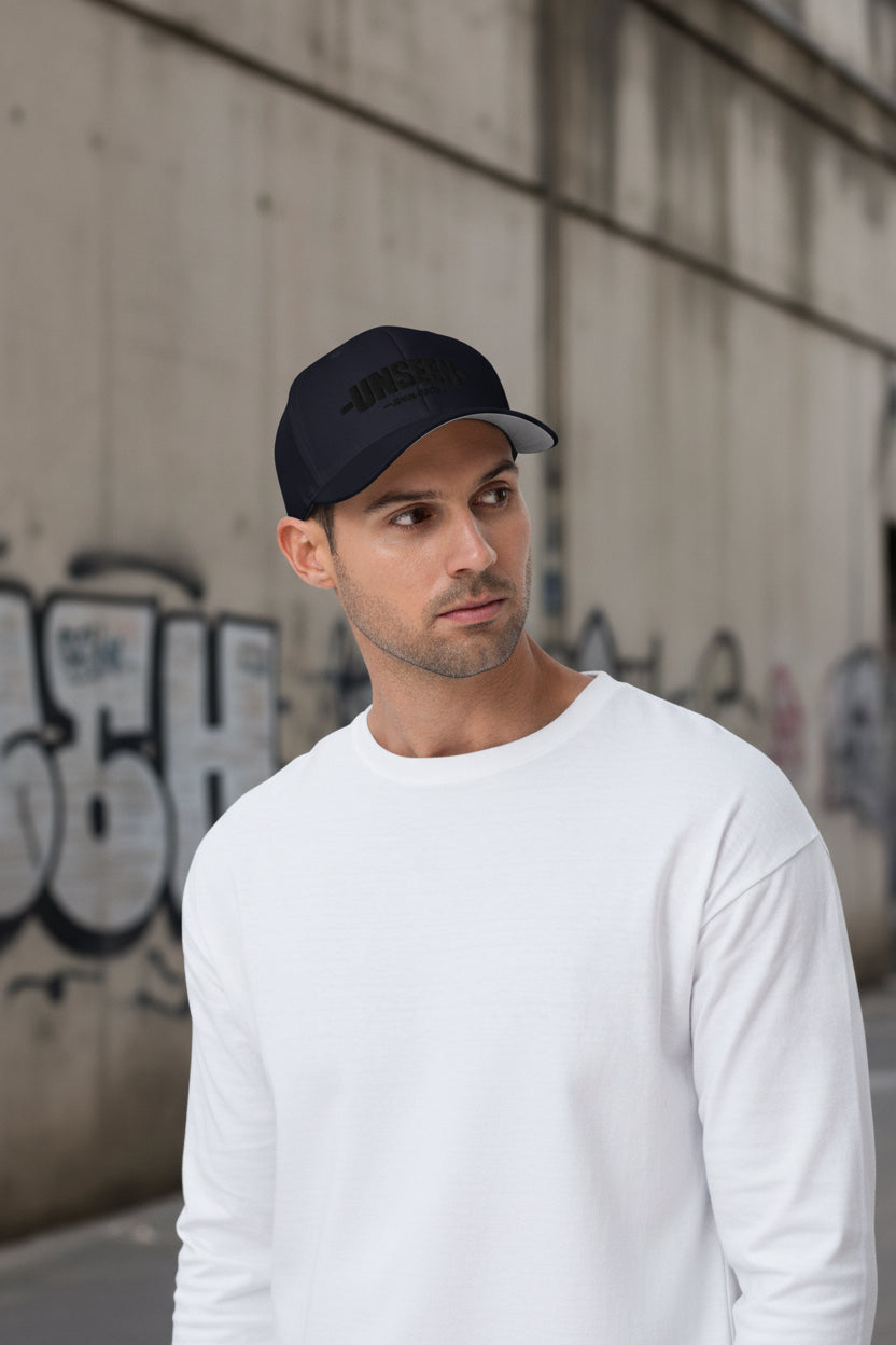 Dark navy Shadow Unseen Urban Structured Twill Cap with closed back and six-panel design, stylish streetwear headwear.