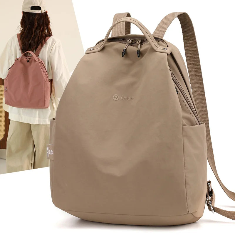 Lightweight nylon backpack by Craftklart Dropship, large capacity travel and school bag, unisex design with multiple compartments.