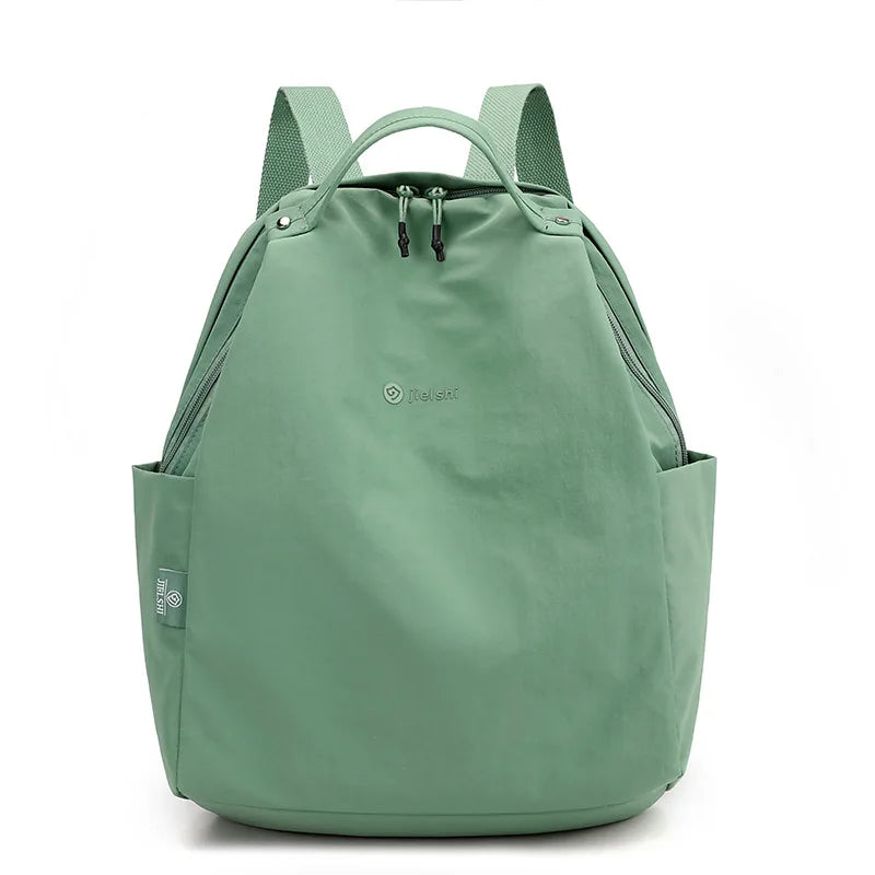 Lightweight nylon backpack by Craftklart Dropship with large capacity, suitable for travel and school, unisex design, showing multiple compartments.
