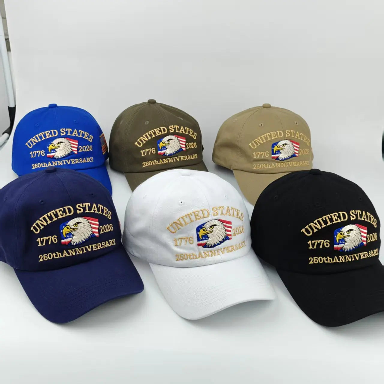 White baseball cap by Craftklart Dropship with embroidered eagle design celebrating 250-year anniversary.