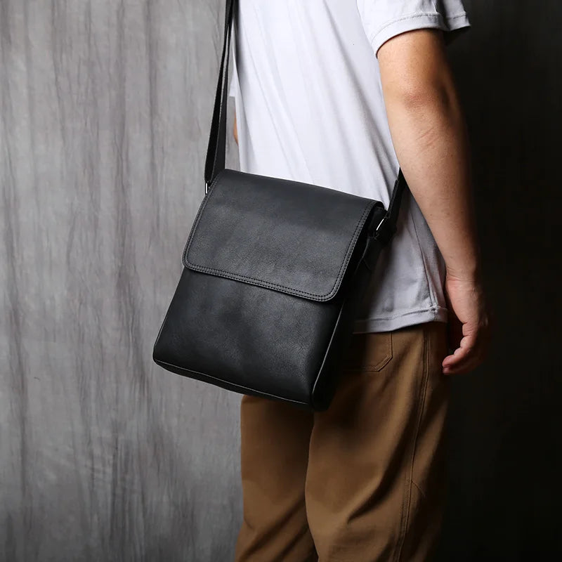 Black leather crossbody shoulder bag for men, crafted by Craftklart Dropship, with sleek urban style and adjustable strap.