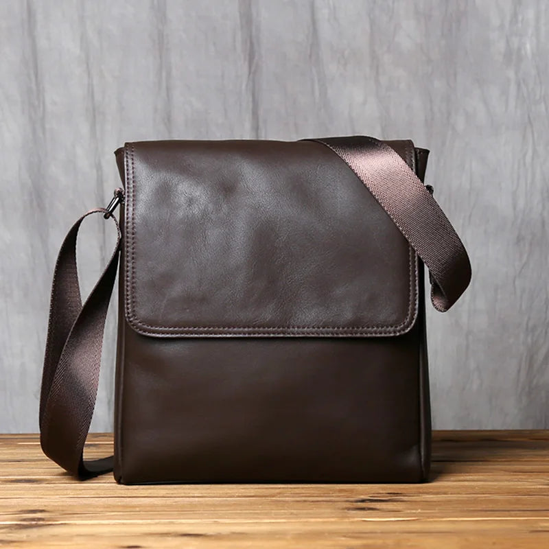 Black urban leather shoulder bag for men by Craftklart Dropship, stylish crossbody bag with adjustable strap and multiple compartments.