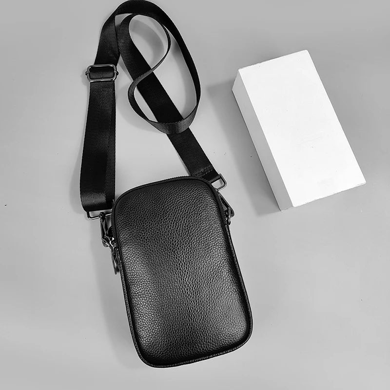 Men's black crossbody bag made of small grain cowhide, urban style, crafted by Craftklart Dropship.