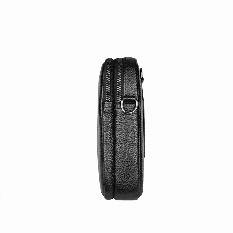 Men's urban black crossbody bag made of small grain cowhide, featuring a compact design and adjustable strap by Craftklart Dropship.