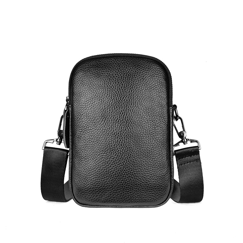 Men's black crossbody bag made of small grain cowhide by Craftklart Dropship, urban style with adjustable strap.