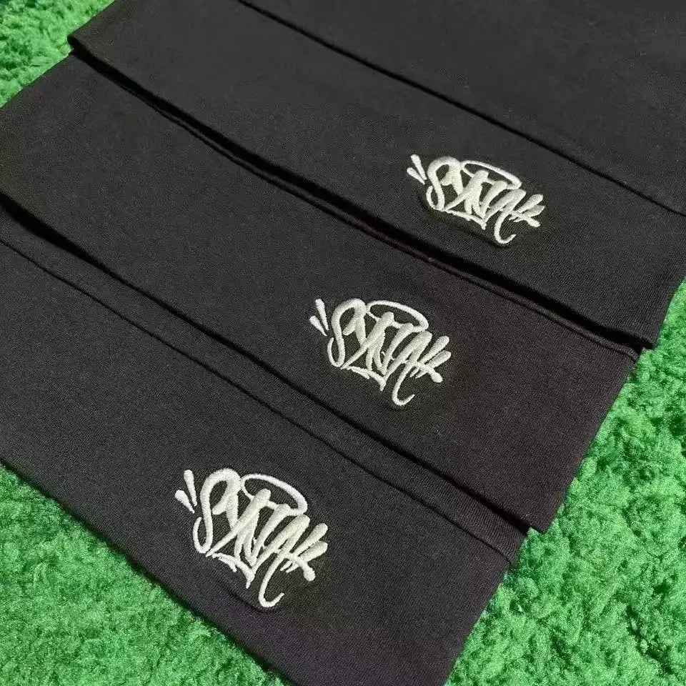Black Fabric Sy-na styled beanie hat from Craftklart Dropship, showing a snug, stretchy knit design for casual winter wear.