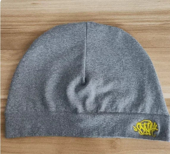 Black Fabric Sy-na Styled Beanie Hat from Craftklart Dropship, showing a snug, knitted beanie with a simple, modern design.