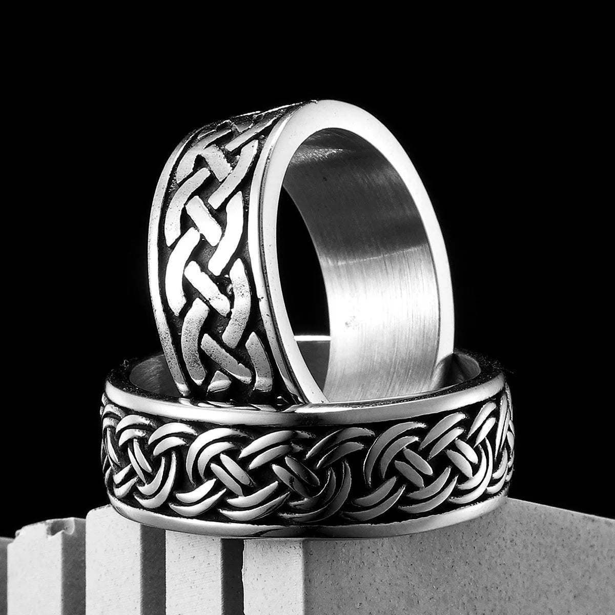 Men's stainless steel Viking-style ring with Celtic knot design, simple aesthetic and bold craftsmanship.