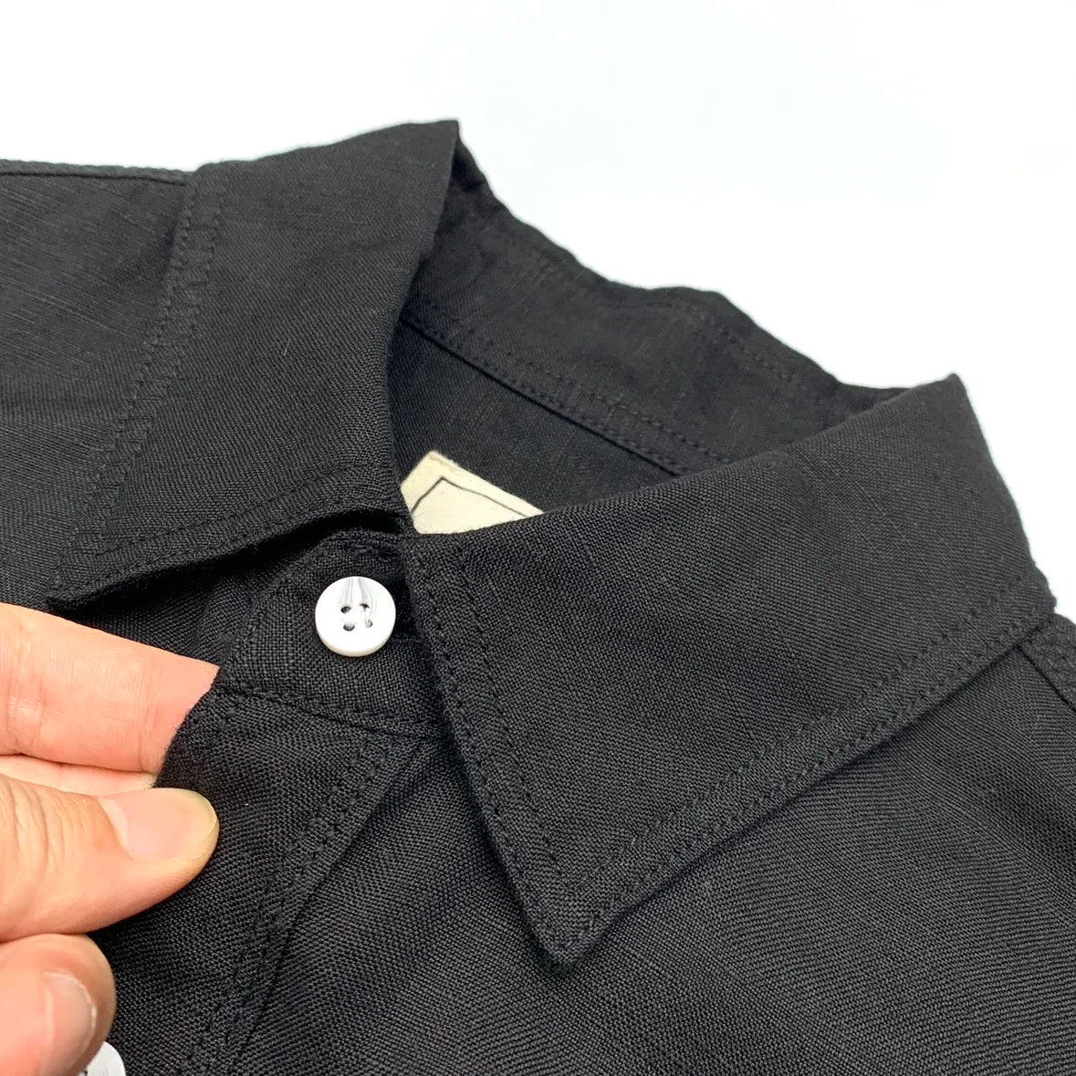 Black men's American Retro cotton linen shirt with relaxed fit and lapel collar, crafted by Craftklart Dropship.