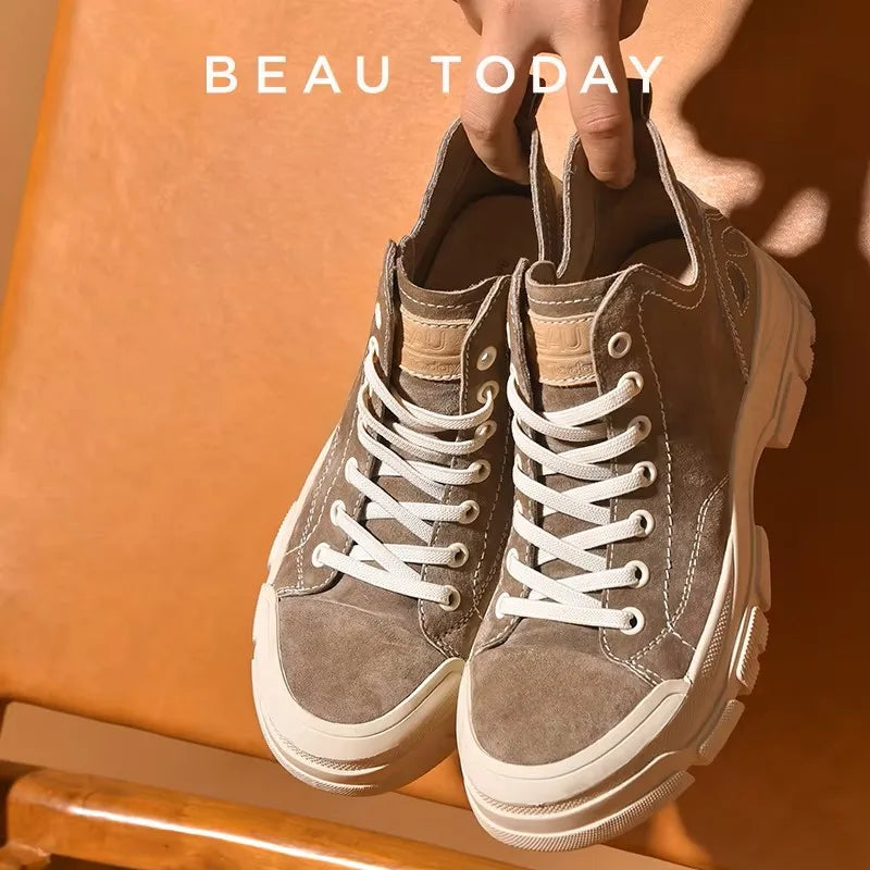 Black women's high top leather sneakers by Craftklart Dropship, featuring a classic design and comfortable fit.