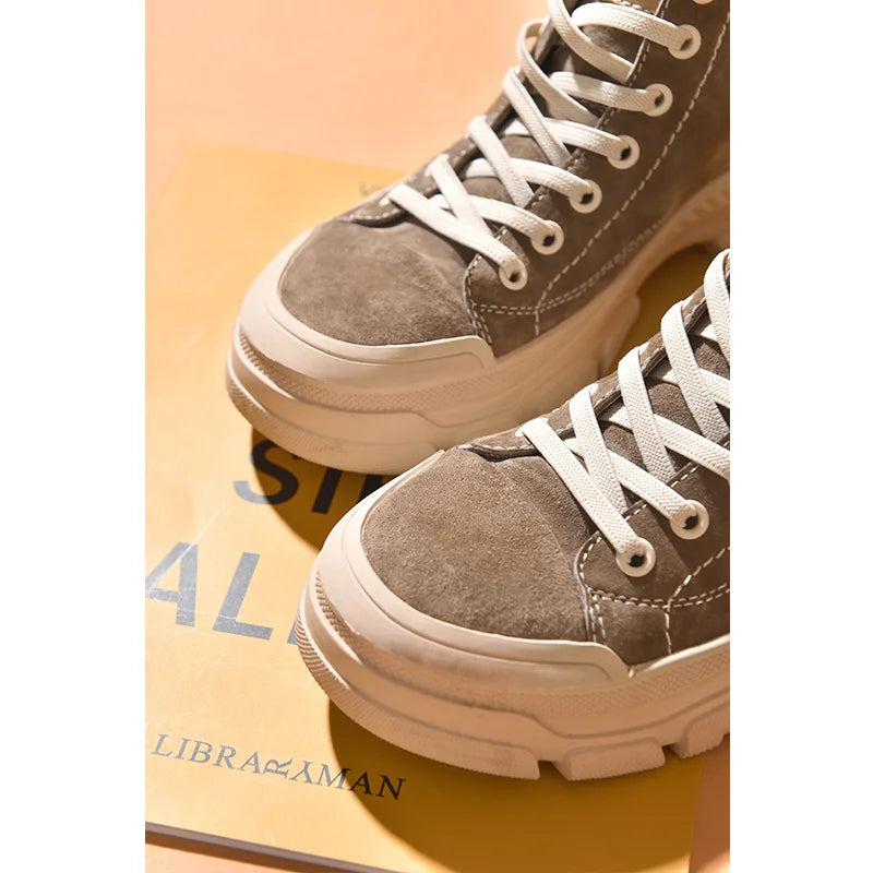 Black women's high top leather sneakers by Craftklart Dropship, showcasing stylish and comfortable footwear for casual wear.