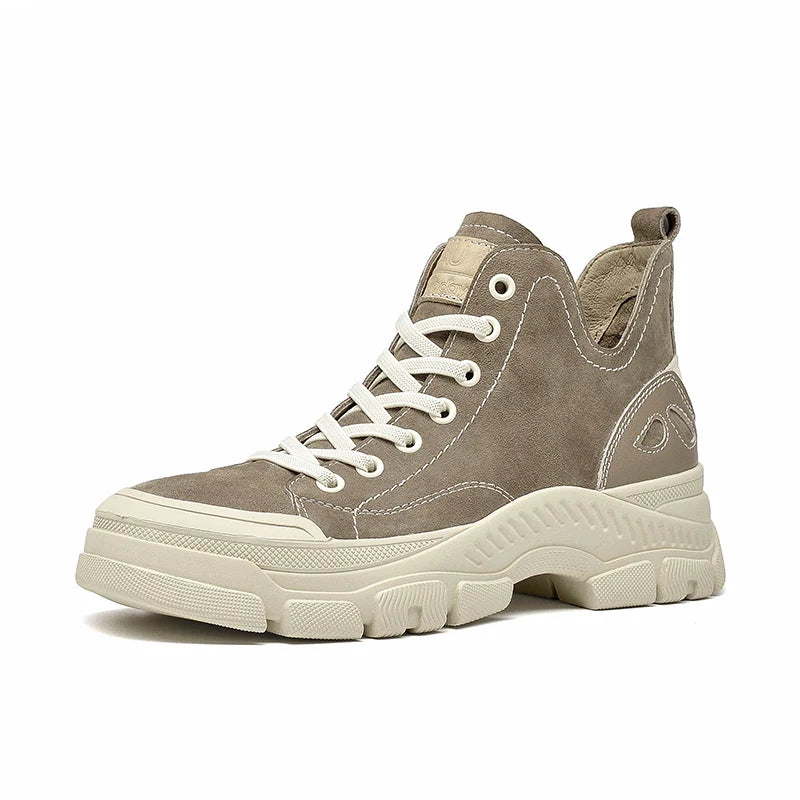 Black women's high top leather sneakers from Craftklart Dropship, showing the stylish shoe with white sole and ankle height design.