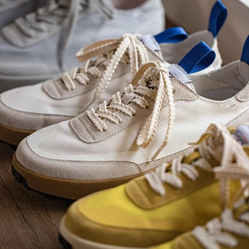 Men's Craftklart Dropship Amber Yellow low-top mesh sneakers with breathable design and casual style.