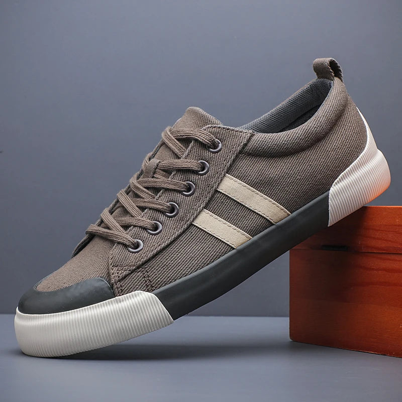 Green men's canvas skate sneakers by Craftklart Dropship with breathable lace-up design and flat sole, available in six colors.