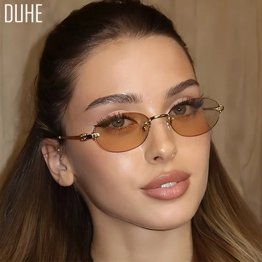 Women's summer frameless oval sunglasses with pink and gold frames, UV400 protection, stylish and lightweight for sunny days.