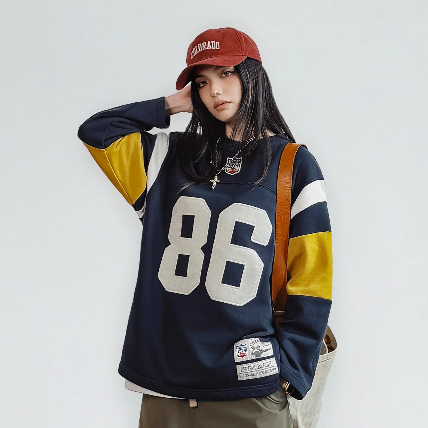 Navy blue women's heavyweight embroidered rugby pullover sweatshirt by Craftklart Dropship, featuring a cozy fit and detailed embroidery.