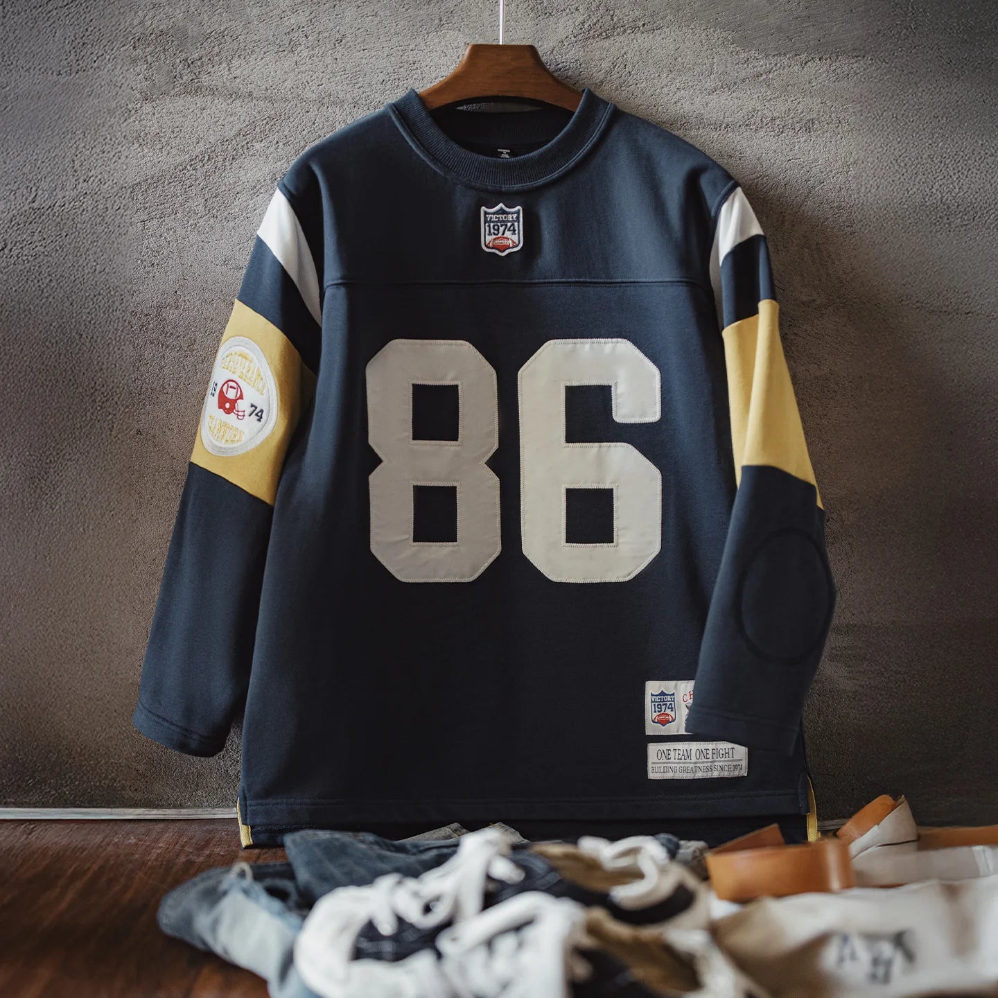 Navy blue women's heavyweight embroidered rugby pullover sweatshirt by Craftklart Dropship, featuring a classic crewneck and embroidered details.