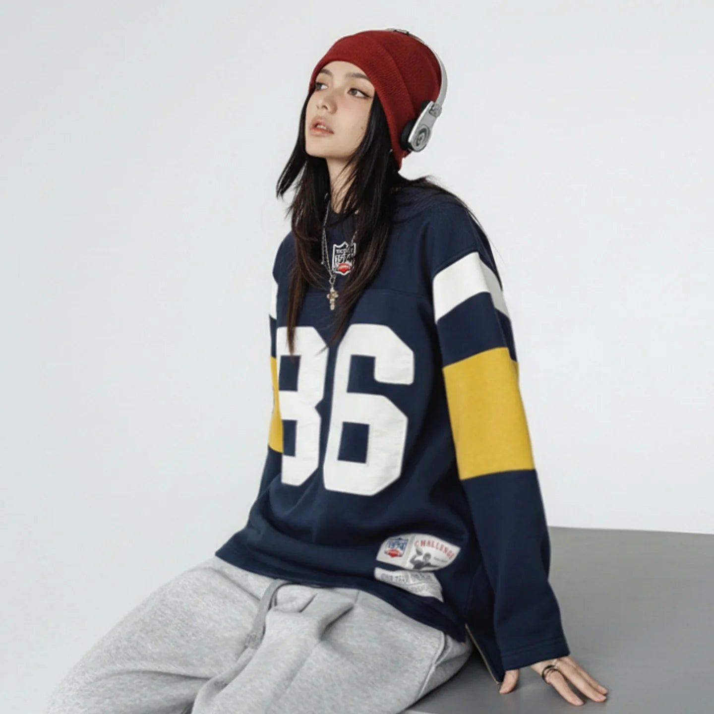 Navy blue women's heavyweight embroidered rugby pullover sweatshirt by Craftklart Dropship, featuring detailed embroidery and a cozy fit.