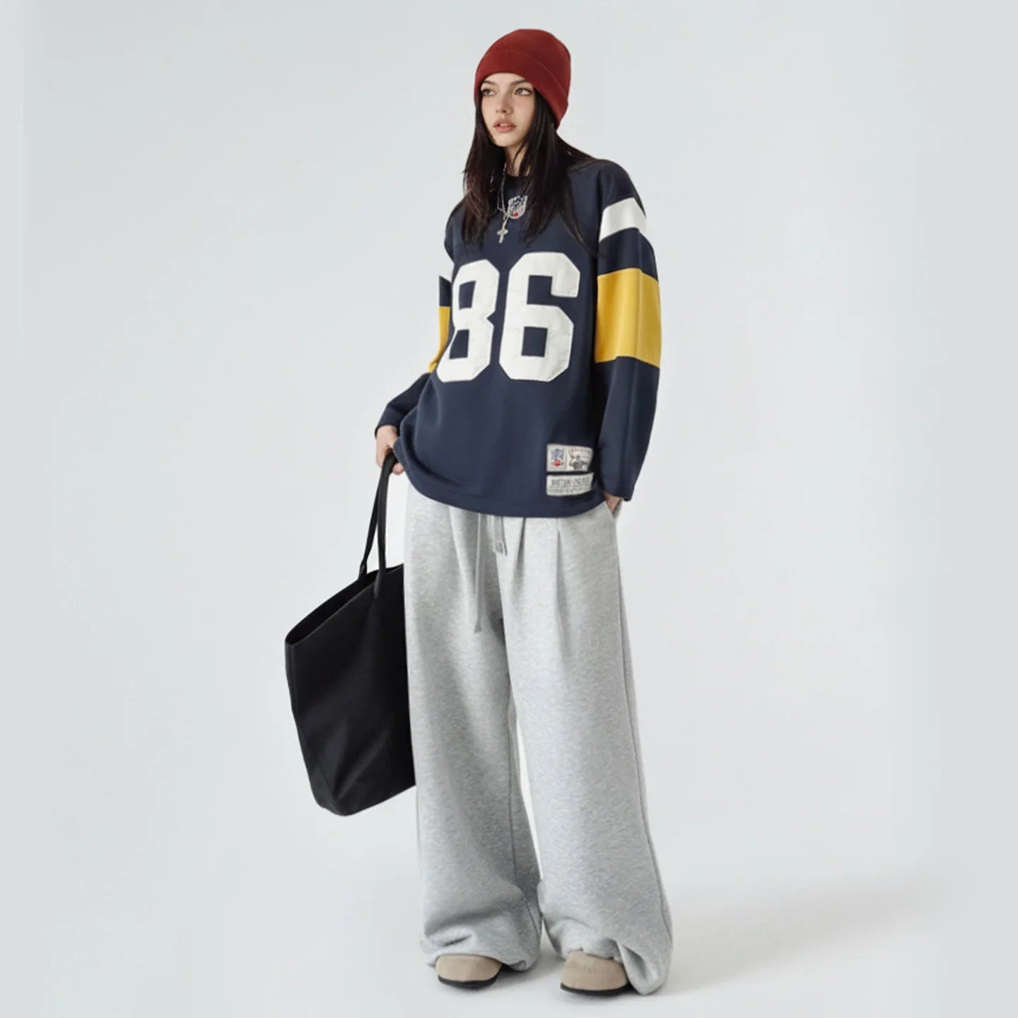 Navy blue women's heavyweight embroidered rugby pullover sweatshirt by Craftklart Dropship, featuring detailed embroidery and a cozy fit.