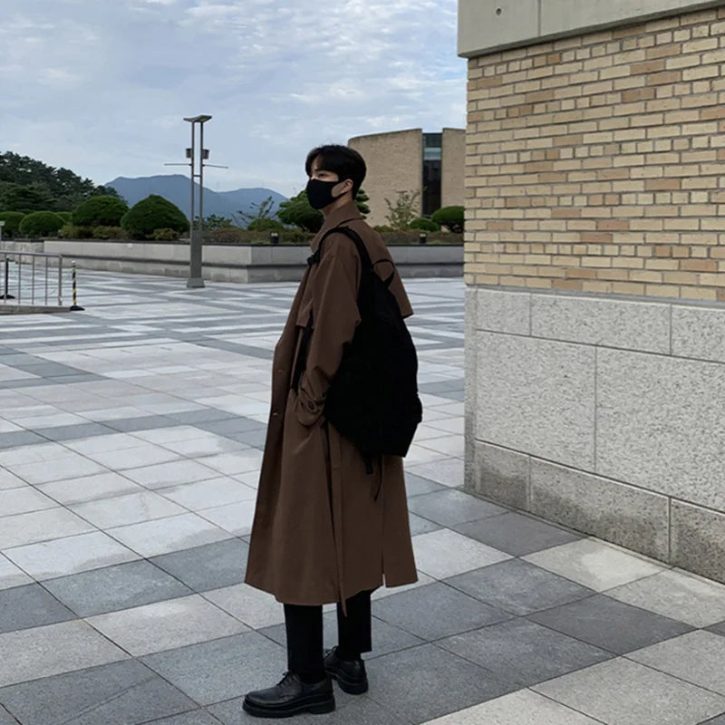 Gray men's urban business trench coat by Craftklart Dropship, stylish overcoat suitable for professional and casual wear.