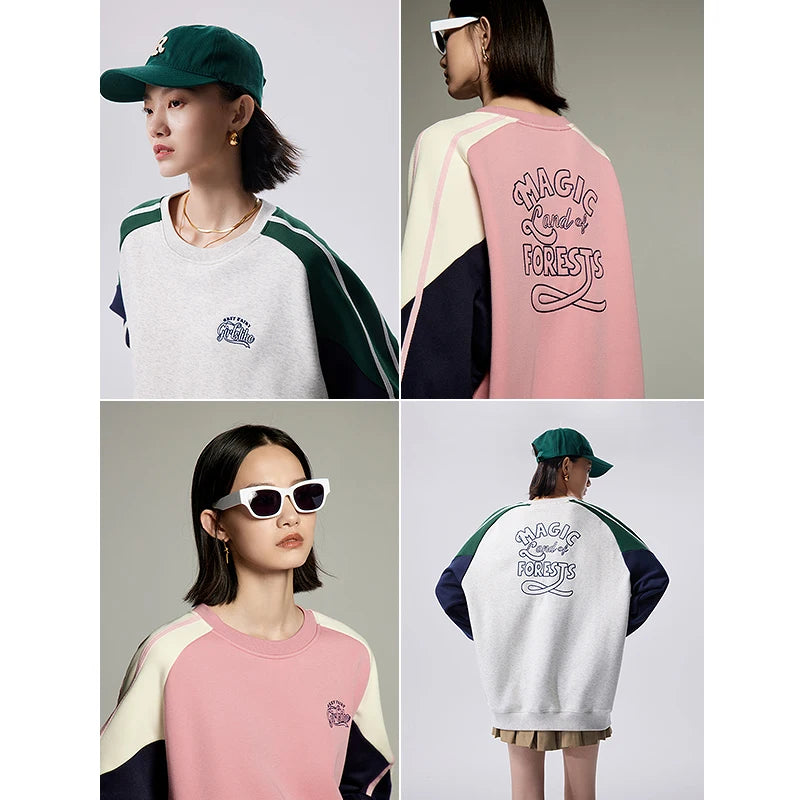 Pink women's retro contrast stitch loose pullover sweatshirt by Craftklart, featuring a cozy, relaxed fit and stylish vintage-inspired design.