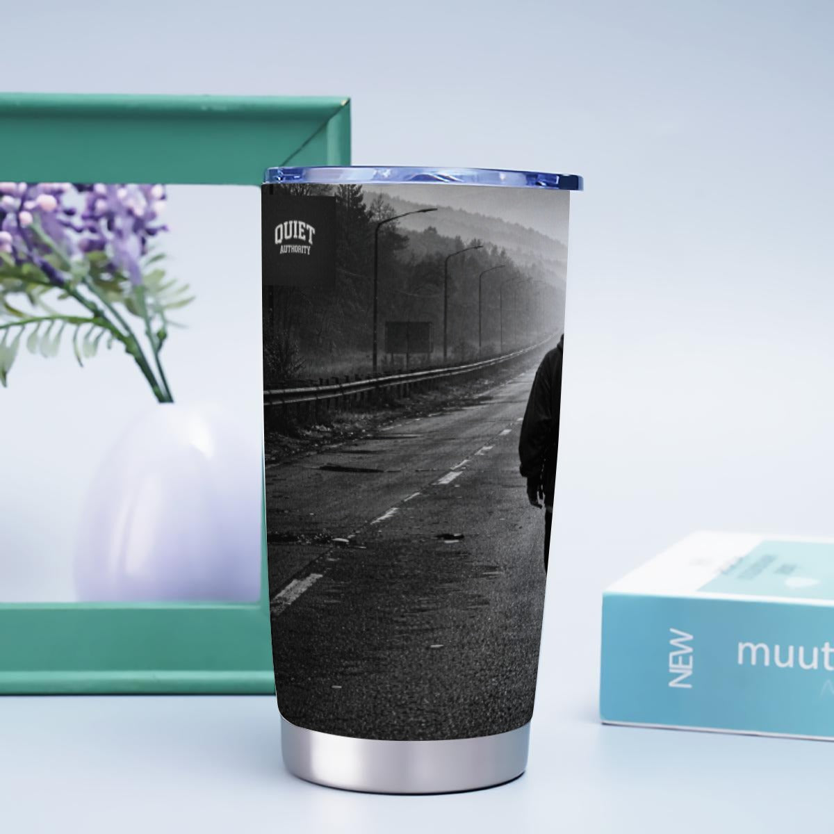 White 20oz stainless steel tumbler from Craftklart with custom print featuring the Quiet Authority design.