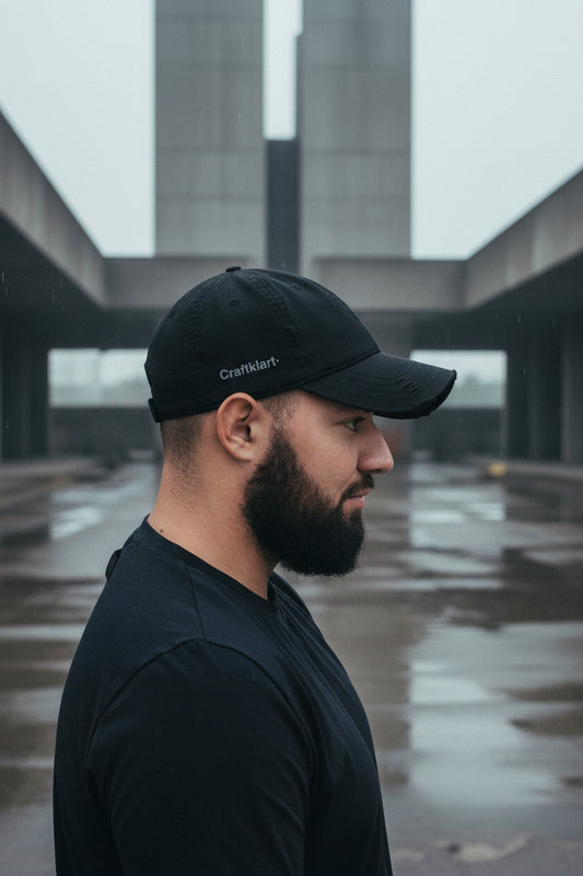 Black Craftklart distressed dad hat baseball cap shown from the right side with a worn, vintage look.