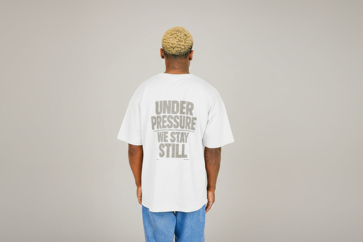 Craftklart 'Still No Noise' organic oversized printed T-shirt featuring a bold graphic design on soft cotton fabric.