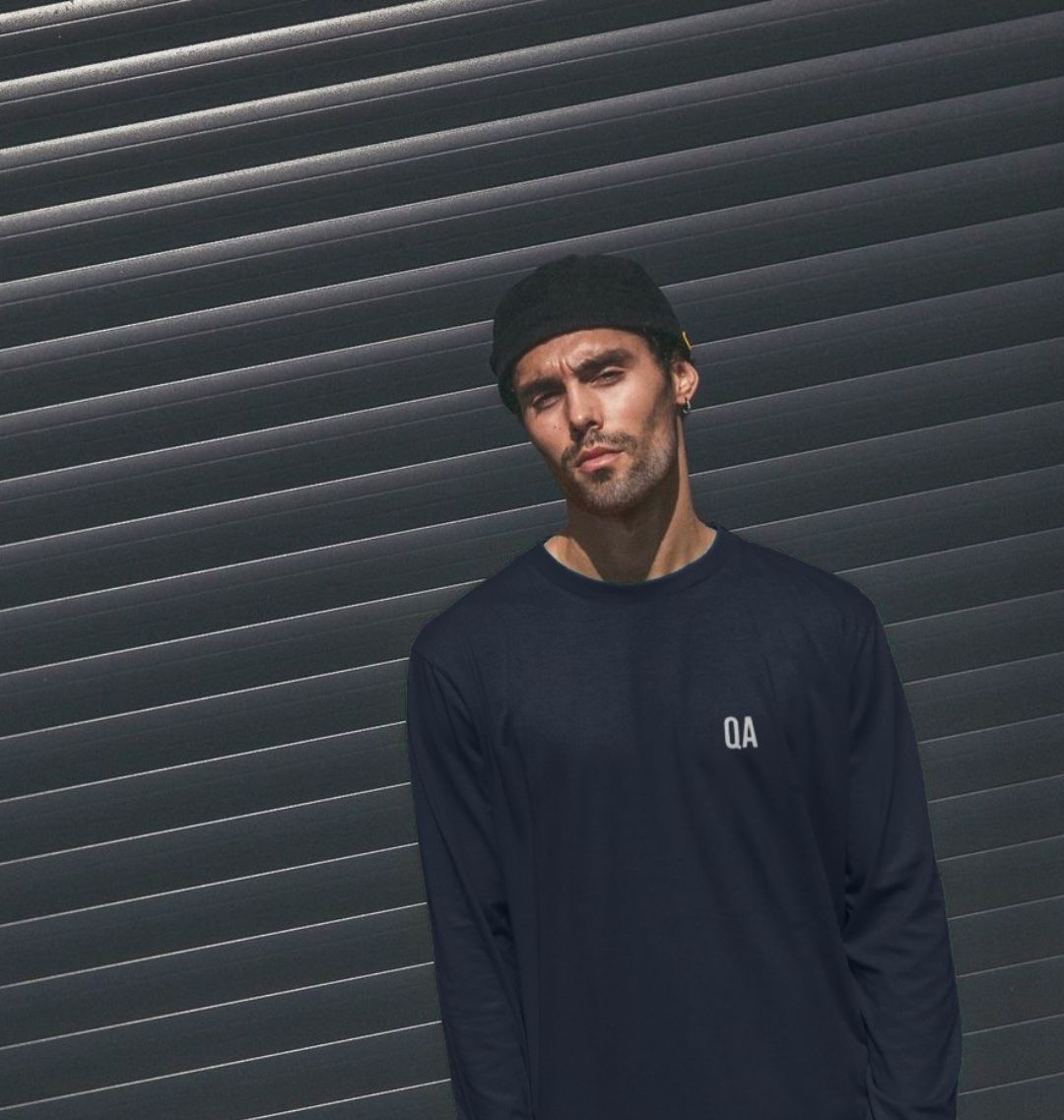 Craftklart organic cotton long sleeve T-shirt in natural color, sustainable streetwear essential, showing front view with soft fabric texture.