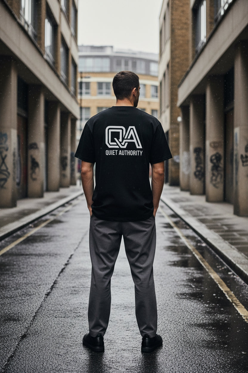 Black Craftklart organic cotton unisex T-shirt with creator graphic on the back, streetwear essential.