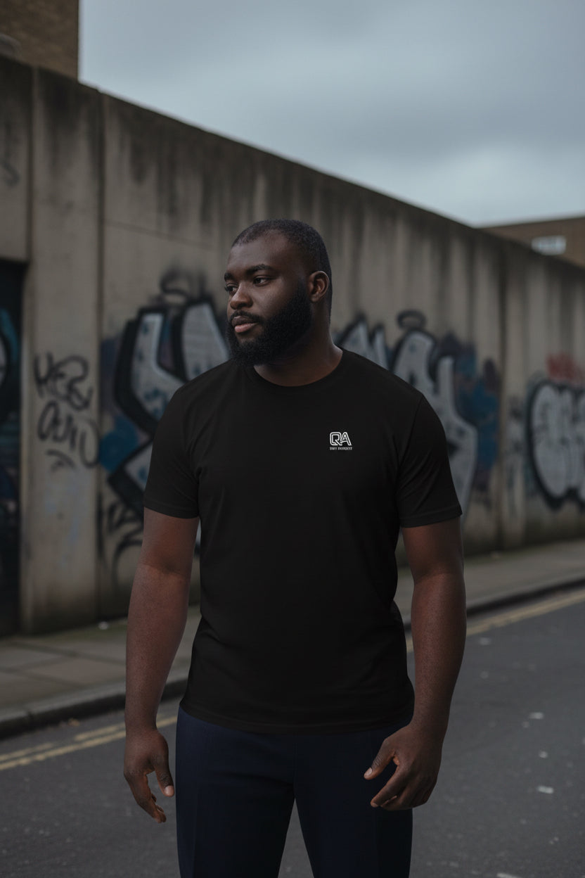 Black Craftklart organic cotton unisex T-Shirt with creator logo front view, streetwear essential, casual and comfortable fit.