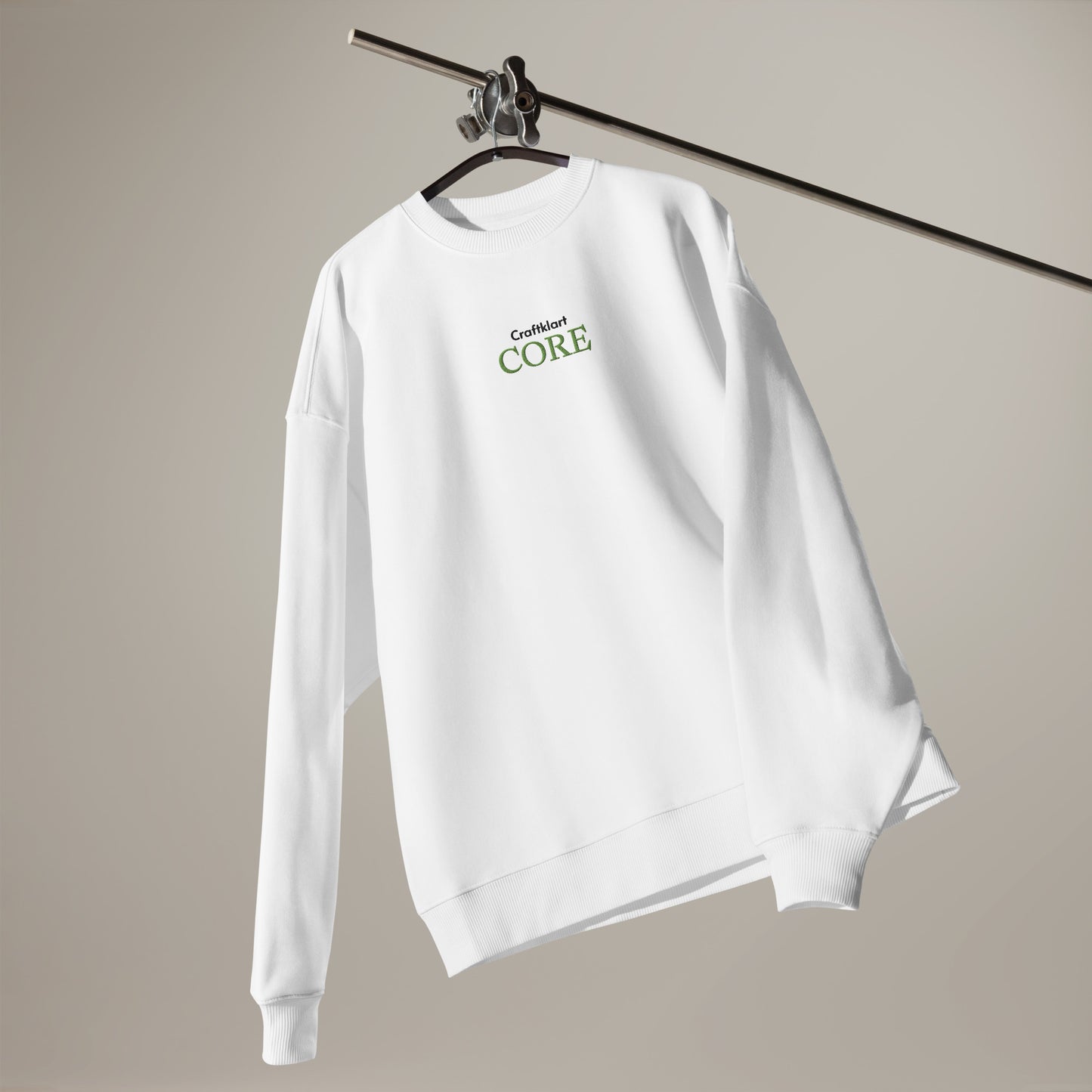 Unisex white organic oversized sweatshirt with ribbed cuffs and crew neck from Craftklart CORE Organic Streetwear collection.