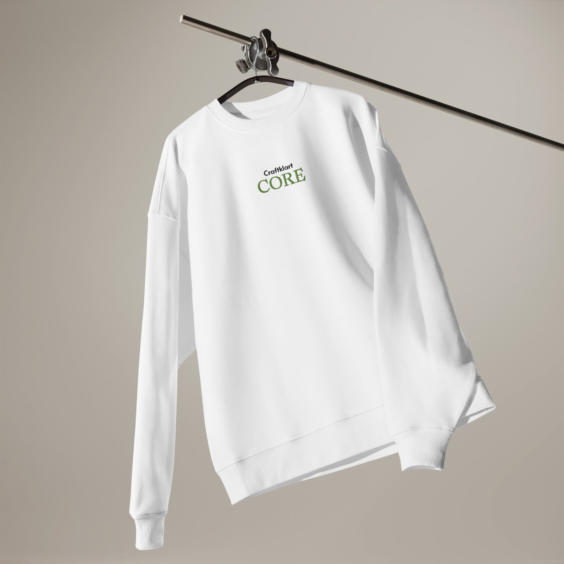 Unisex white organic oversized sweatshirt with ribbed cuffs and crew neck from Craftklart CORE Organic Streetwear collection.