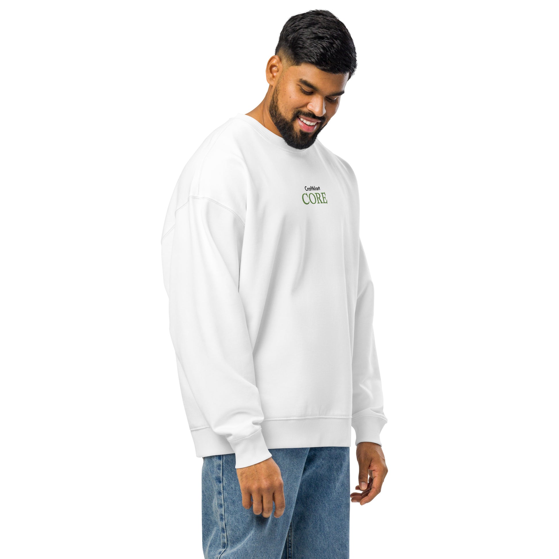 Unisex white organic oversized sweatshirt from Craftklart CORE Organic collection, featuring a relaxed fit and streetwear style.